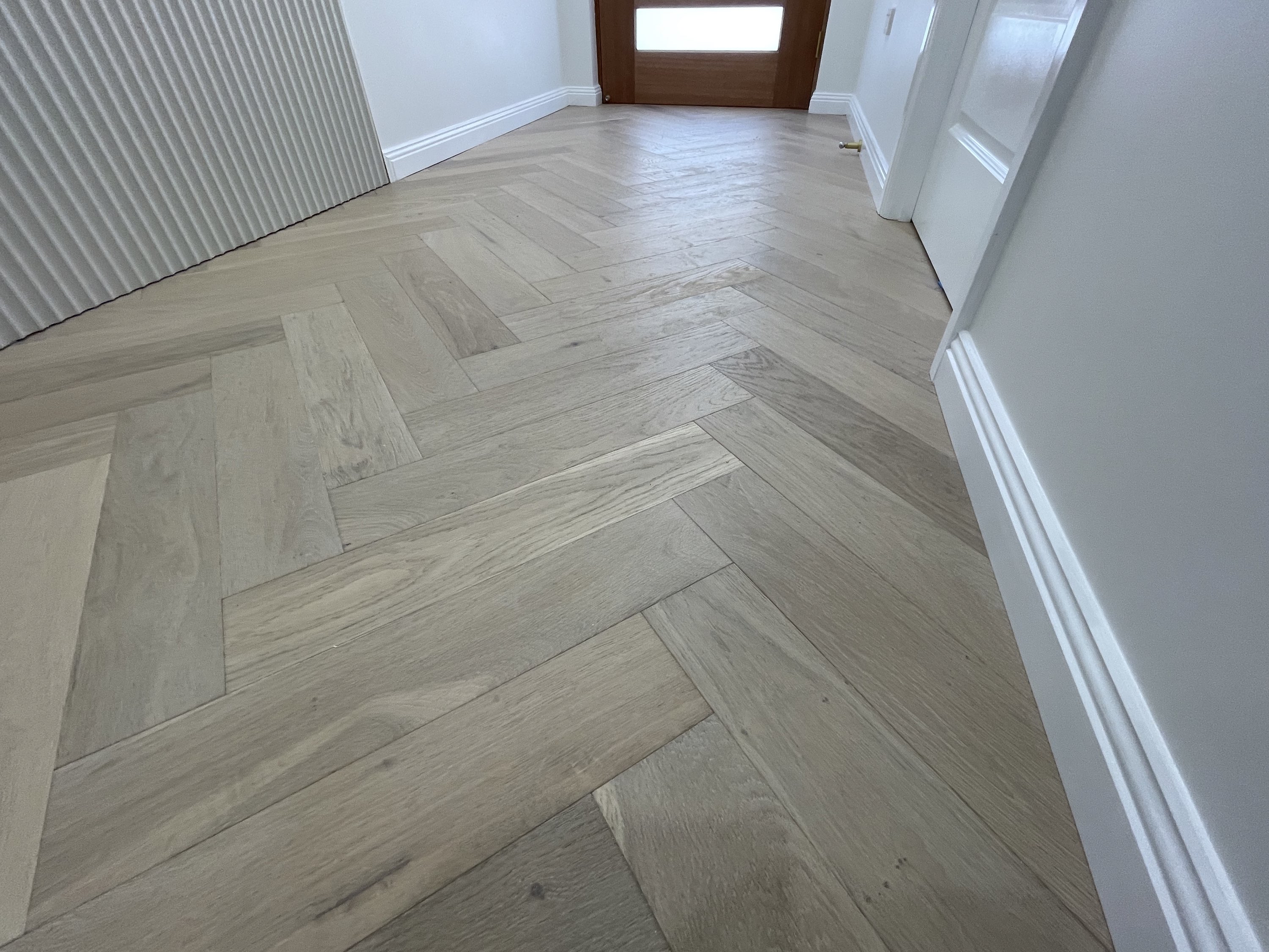 Herringbone flooring by Pro Build Carpenter